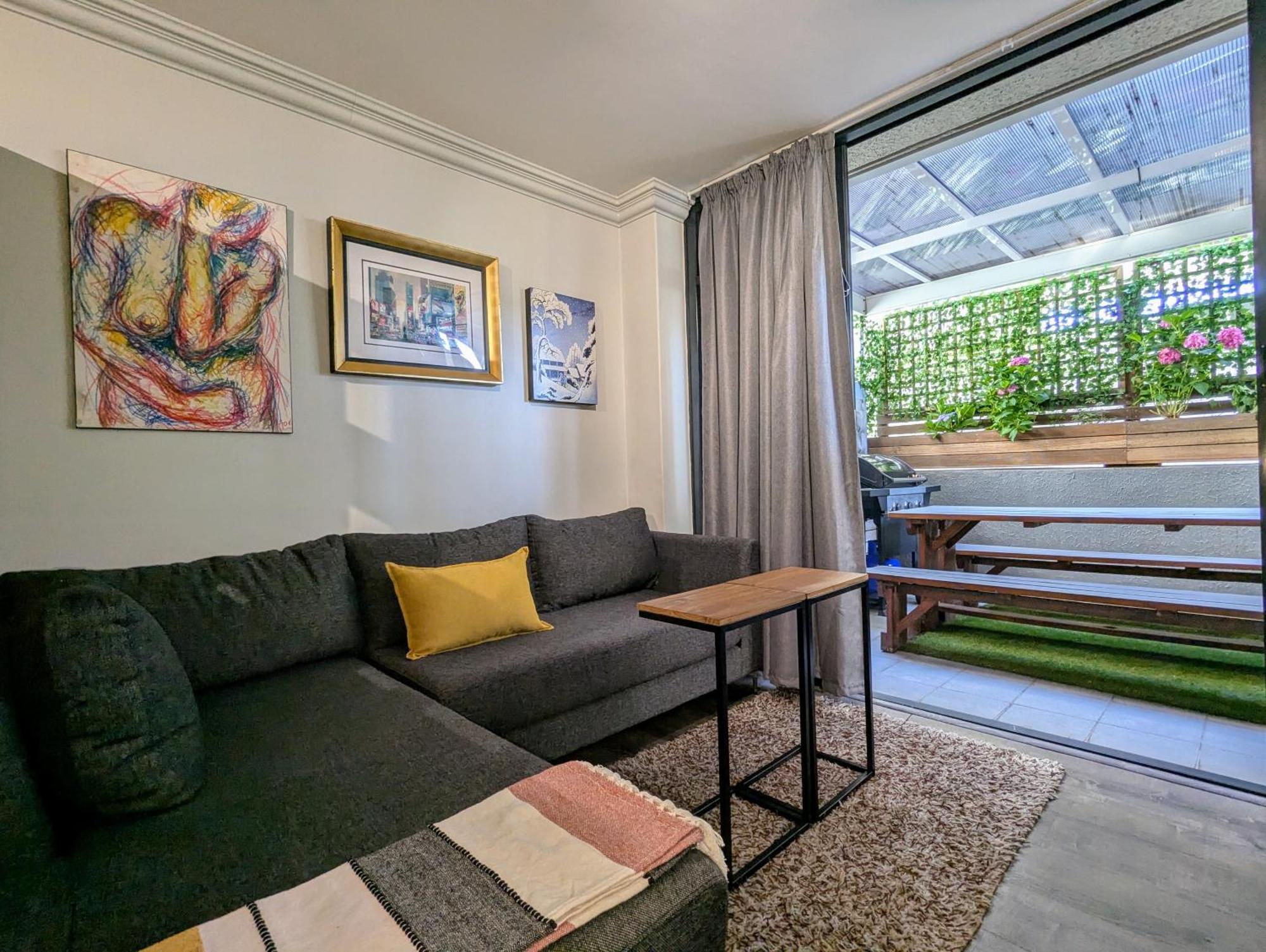 Urban With Lush Patio Braai & Rooftop Pool Apartment