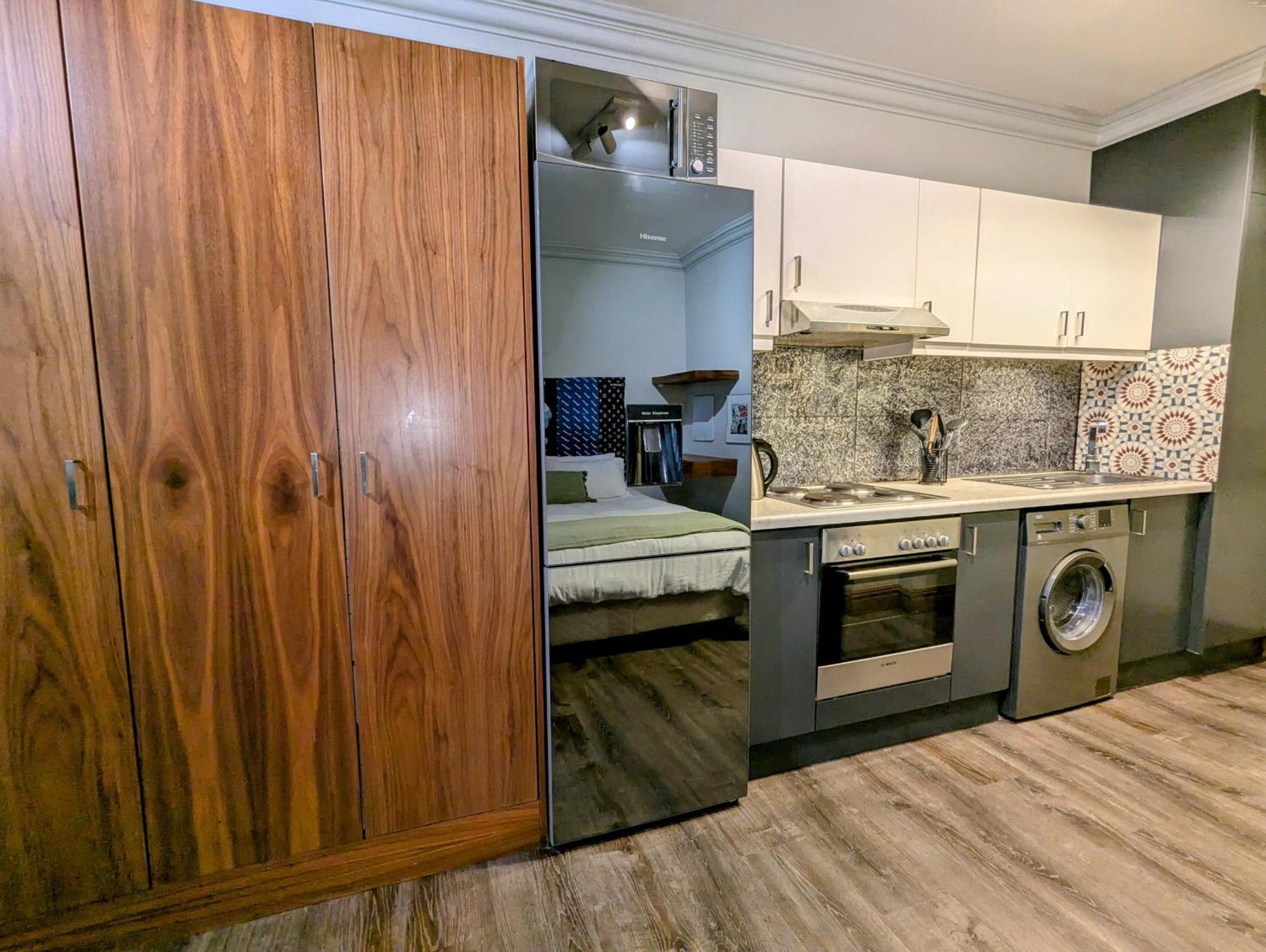 Apartment Urban With Lush Patio Braai & Rooftop Pool